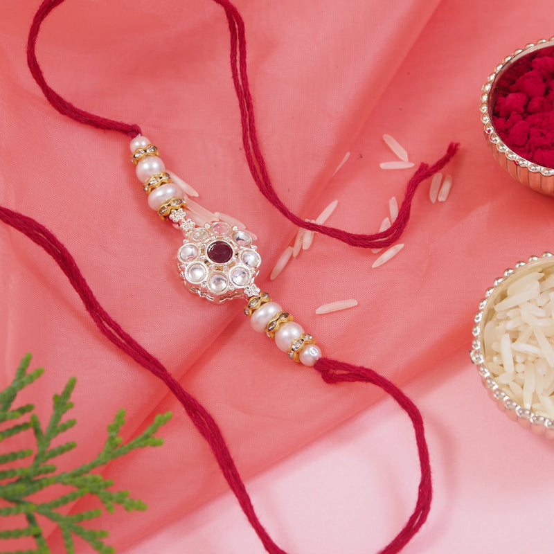 Delicate Pearl Beads Maroon Rakhi with Roli Chawal & Rakshabandhan Card