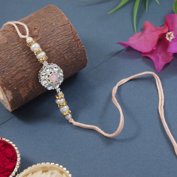 Delicate Pearl Beads Peach Rakhi with Roli Chawal & Rakshabandhan Card