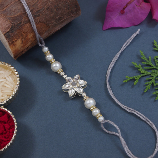 Delicate Pearl Beads Grey Rakhi with Roli Chawal & Rakshabandhan Card