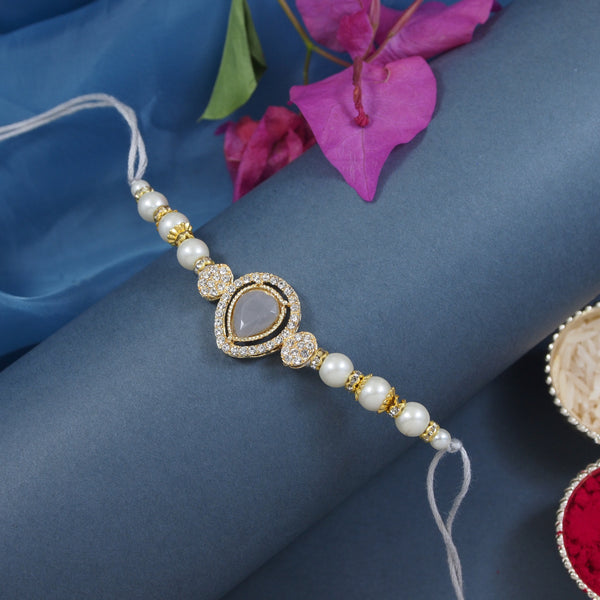 Delicate Pearl Beads Grey Rakhi with Roli Chawal & Rakshabandhan Card