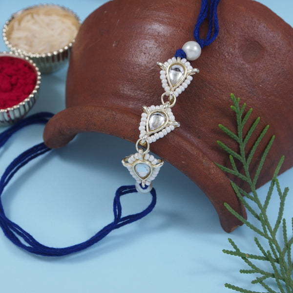 Delicate Pearl Beads Blue Rakhi with Roli Chawal & Rakshabandhan Card