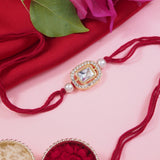 Delicate Pearl Beads Maroon Rakhi with Roli Chawal & Rakshabandhan Card