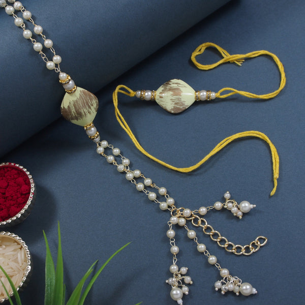 Elegant Bhaiya Bhabhi Yellow Lumba Pearl & Rakhi With Roli Chawal &Card