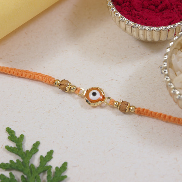 Delicate Peach Enamel Evil Eye Rakhi with Roli Chawal & Rakshabandhan Card