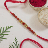 DELICATE PEARL BEADED RAKHI WITH ROLI CHAWAL & RAKSHABANDHAN CARD