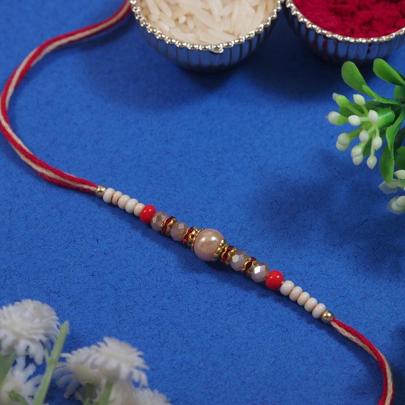 DELICATE PEARL BEADED RAKHI WITH ROLI CHAWAL & RAKSHABANDHAN CARD