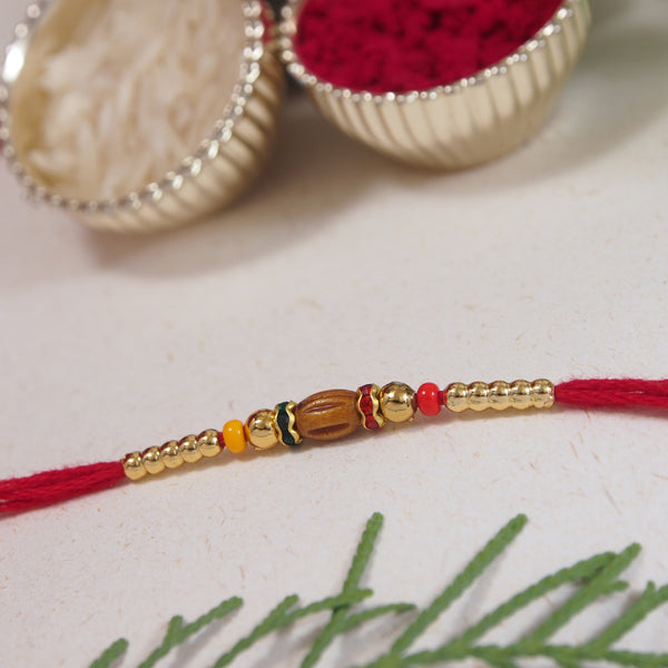 DELICATE PEARL BEADED RAKHI WITH ROLI CHAWAL & RAKSHABANDHAN CARD