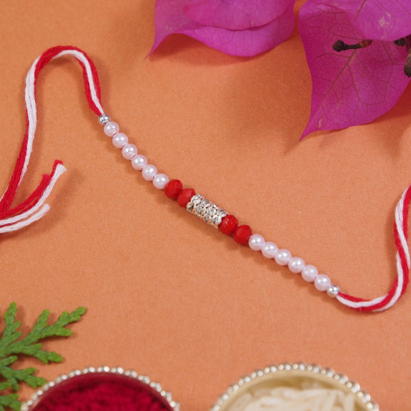 DELICATE Red PEARL BEADED RAKHI WITH ROLI CHAWAL & RAKSHABANDHAN CARD