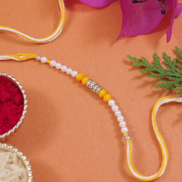 DELICATE Yellow PEARL BEADED RAKHI WITH ROLI CHAWAL & RAKSHABANDHAN CARD