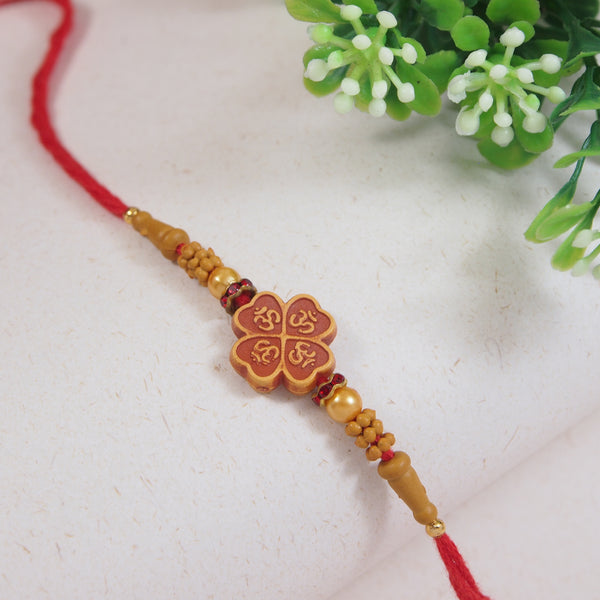 DELICATE PEARL BEADED RAKHI WITH ROLI CHAWAL & RAKSHABANDHAN CARD