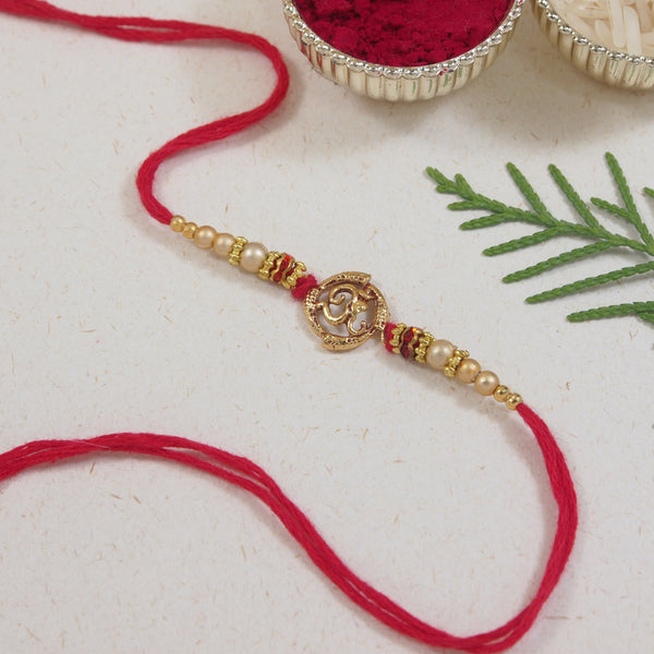 DELICATE PEARL BEADED Peacock RAKHI WITH ROLI CHAWAL & RAKSHABANDHAN CARD