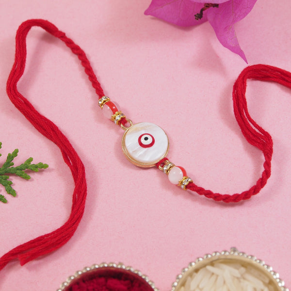 Delicate White Enamel Evil Eye Rakhi with Roli Chawal & Rakshabandhan Card